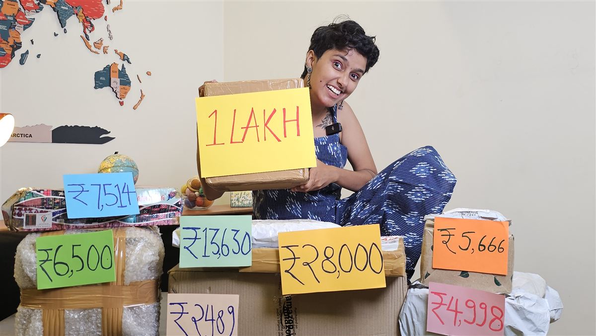 Kavya holding up brand-deal parcels labelled with what each one paid, up to 1 lakh